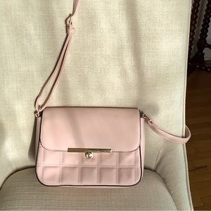 Beautiful blush colored Crossbody purse with adjustable strap